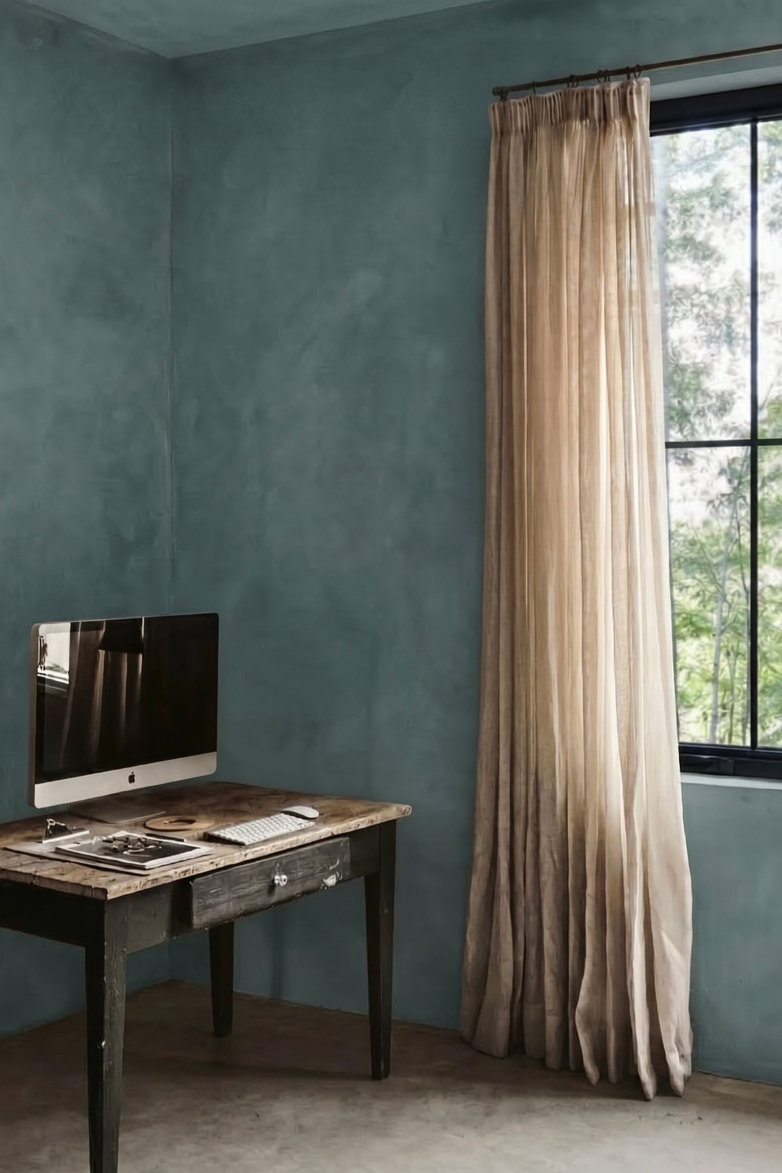 Home office with blue green limewash walls