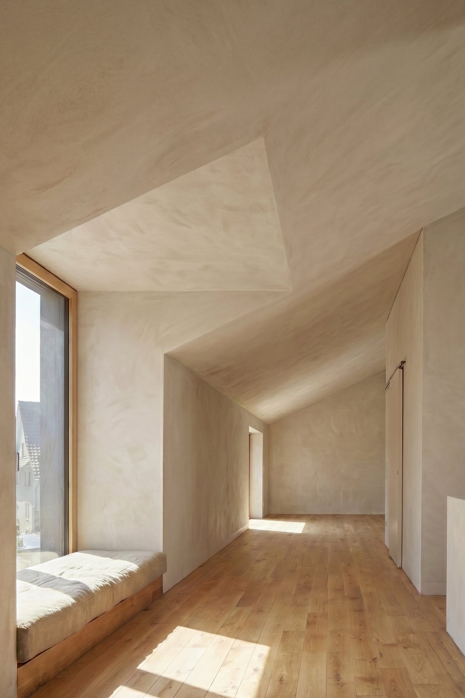 Modern interior with beige limewash walls and large window, minimalistic design